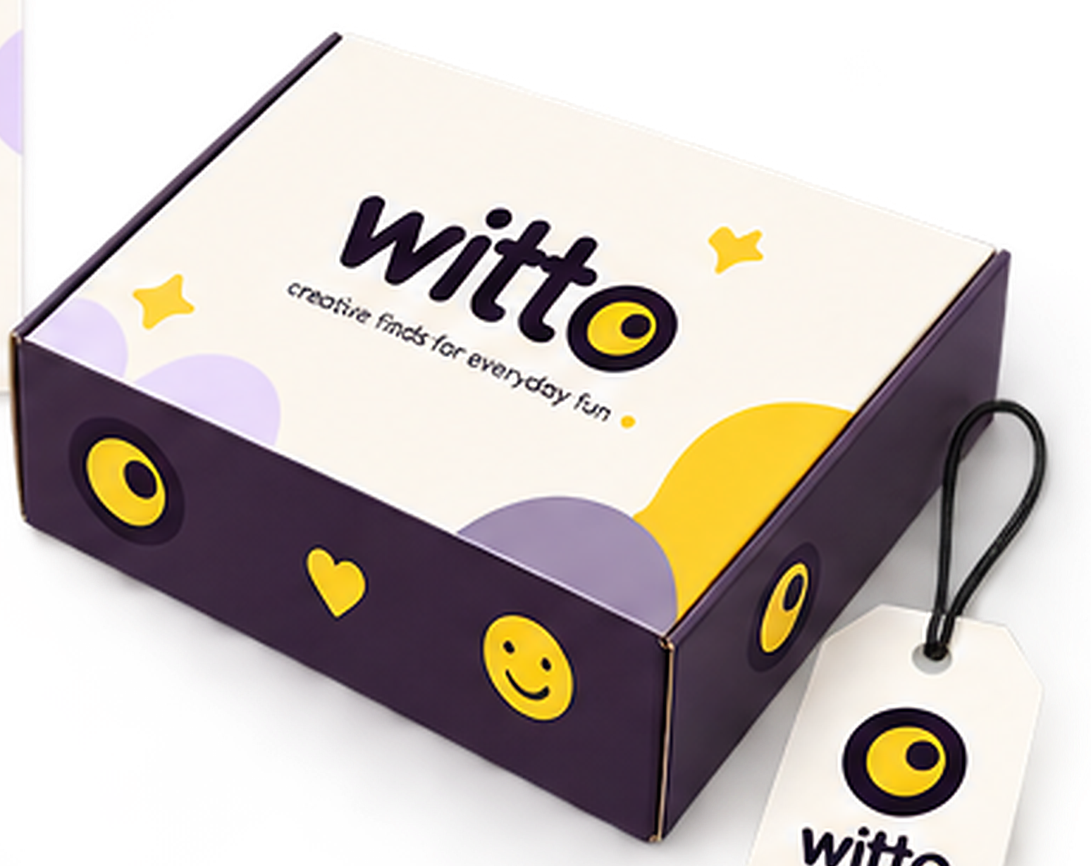 The Witto Mystery Box — a cream and deep plum box printed with the witto eye, beside a hang tag.